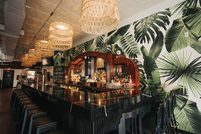 bar with a chandelier