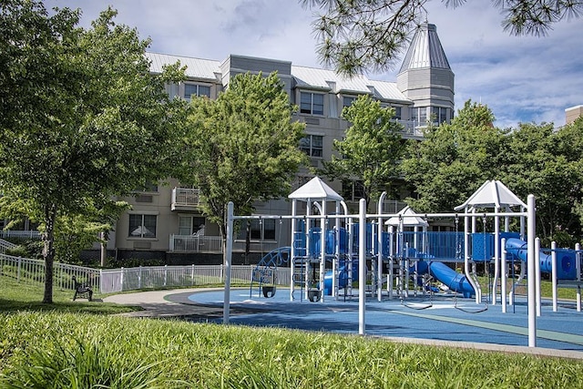 communal playground featuring fence