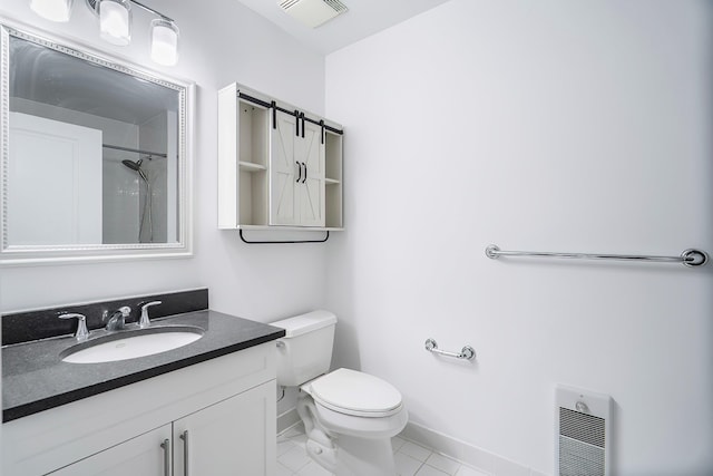 bathroom featuring visible vents, toilet, heating unit, vanity, and a shower