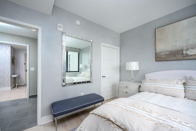 bedroom featuring dark hardwood / wood-style floors