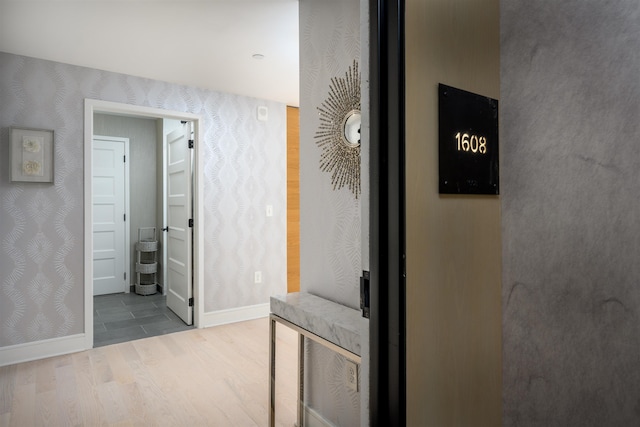 hallway featuring light hardwood / wood-style flooring