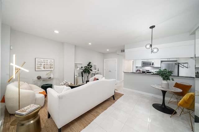 96 Tidewater St Unit 1G, Jersey City, NJ 07302 - living area featuring light tile patterned floors and recessed lighting