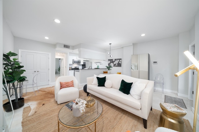 96 Tidewater St Unit 1G, Jersey City, NJ 07302 - living room with recessed lighting and baseboards