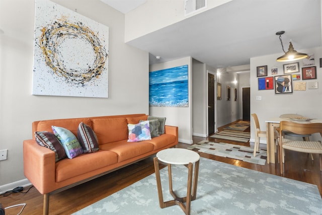 187 Wayne St Unit C405, Jersey City, NJ 07302 - living room featuring wood finished floors and baseboards
