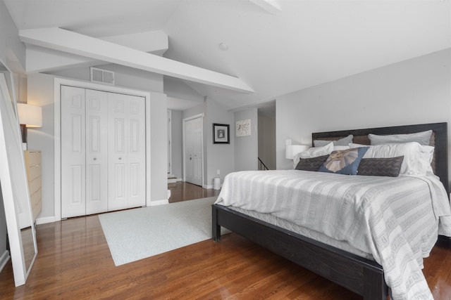 187 Wayne St Unit C405, Jersey City, NJ 07302 - bedroom with wood finished floors, vaulted ceiling, and a closet