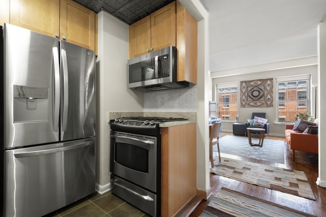 187 Wayne St Unit C405, Jersey City, NJ 07302 - kitchen with stainless steel appliances, light countertops, and open floor plan