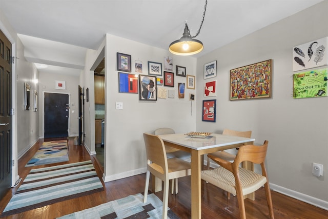 187 Wayne St Unit C405, Jersey City, NJ 07302 - dining room with dark wood-type flooring and baseboards