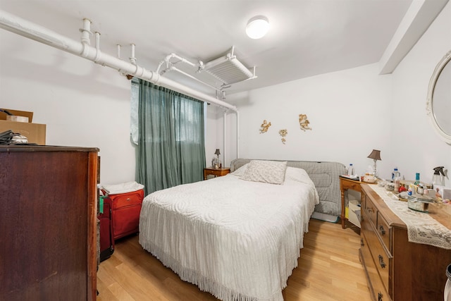 bedroom featuring light hardwood / wood-style floors