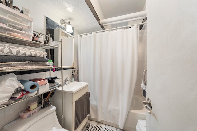 bathroom with vanity and shower / bathtub combination with curtain