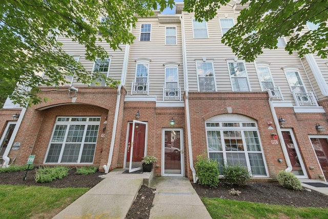 265 Custer Ave Unit 103, Jersey City, NJ 07305 - townhome / multi-family property with brick siding