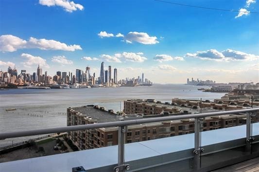 property view of water with a view of city