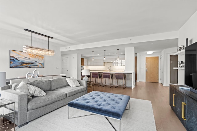 living room with wood finished floors