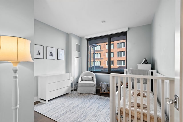 bedroom featuring wood finished floors