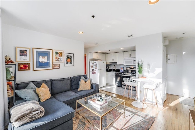 living room featuring light hardwood / wood-style floors