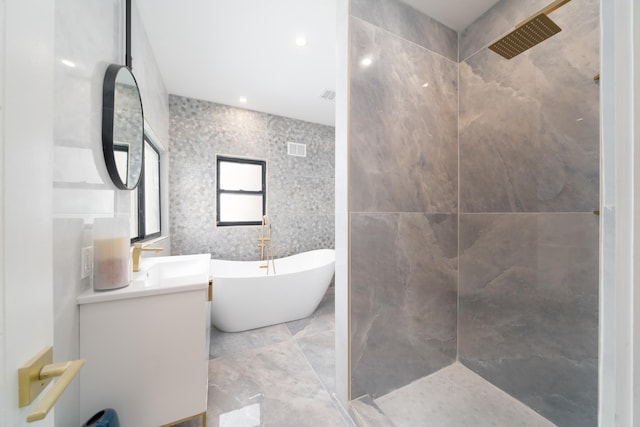166 Steuben St Unit 1A, Jersey City, NJ 07302 - full bath featuring a freestanding tub, a tile shower, vanity, and tile walls