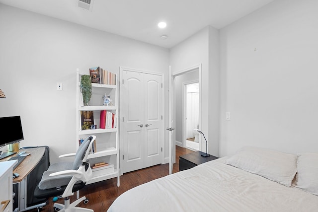 42 Grace St Unit 2A, Jersey City, NJ 07307 - bedroom with wood finished floors, a desk, a closet, and recessed lighting