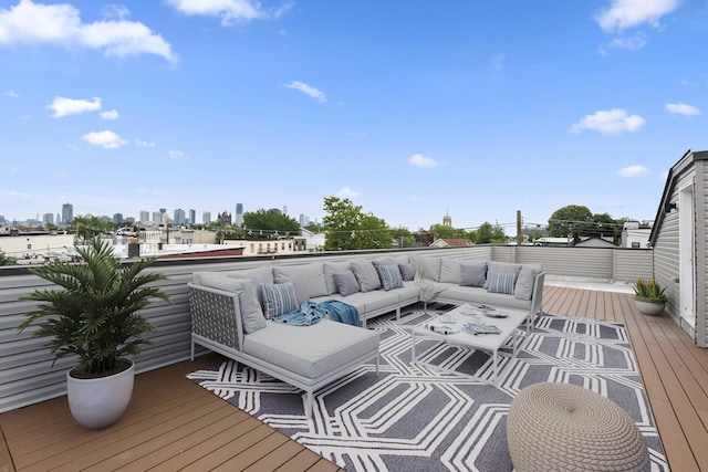119 Van Horne St Unit 2, Jersey City, NJ 07304 - wooden deck featuring outdoor lounge area and a view of skyline