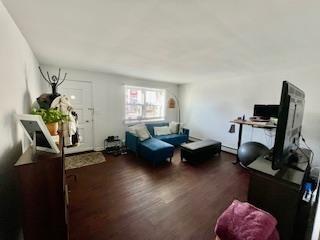 living area with wood finished floors