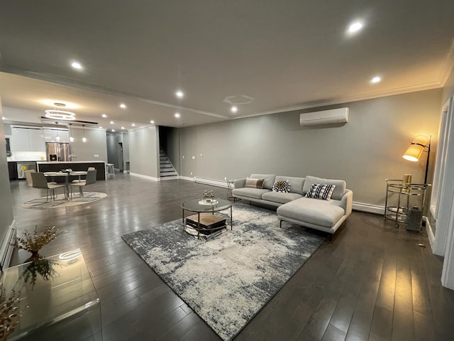 living area with stairs, an AC wall unit, dark wood-type flooring, and baseboard heating