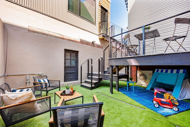 294 4th St, Jersey City, NJ 07302 - exterior space with outdoor lounge area, a patio, washer / dryer, and stairs