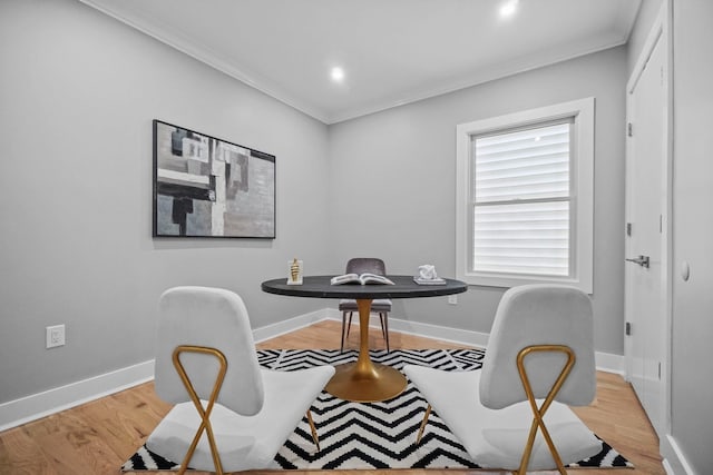 office featuring ornamental molding and light wood-type flooring