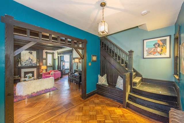 68 Osborne St, Glen Ridge, NJ 07028 - stairway featuring a fireplace and baseboards