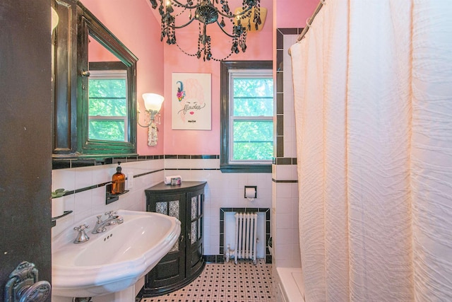 68 Osborne St, Glen Ridge, NJ 07028 - full bathroom with radiator heating unit, healthy amount of natural light, tile walls, a shower with curtain, and wainscoting