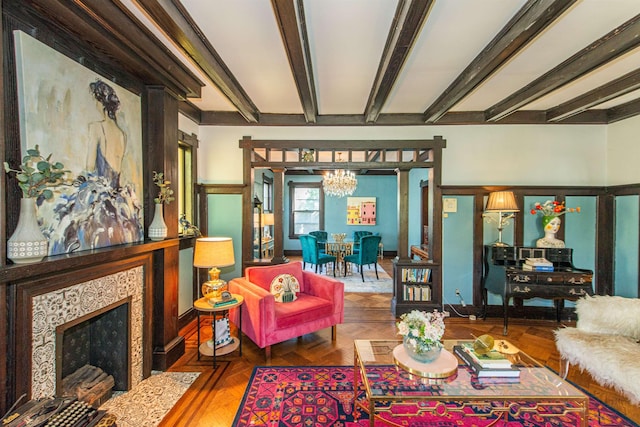 68 Osborne St, Glen Ridge, NJ 07028 - living area with a chandelier, a high end fireplace, and beamed ceiling