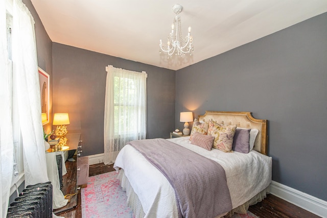 68 Osborne St, Glen Ridge, NJ 07028 - bedroom with a chandelier and wood finished floors