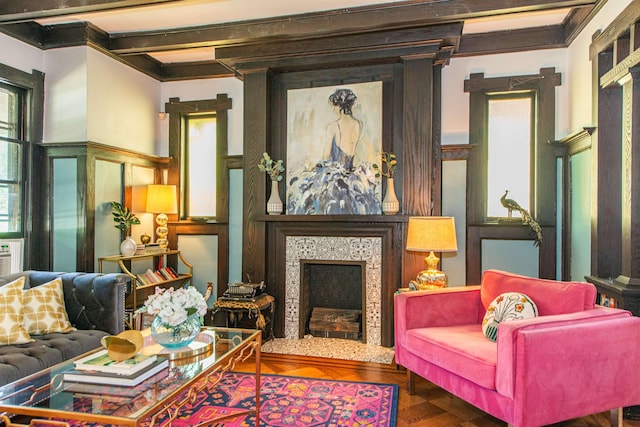 68 Osborne St, Glen Ridge, NJ 07028 - living room featuring a premium fireplace, a decorative wall, wood finished floors, crown molding, and a wainscoted wall