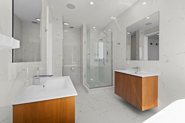 5 Washington Pl, Cliffside Park, NJ 07010 - full bathroom featuring marble finish floor, two vanities, a sink, and a marble finish shower