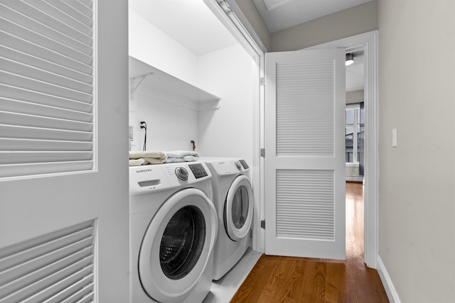 405 Commercial Ave, Cliffside Park, NJ 07010 - laundry area with independent washer and dryer and wood finished floors