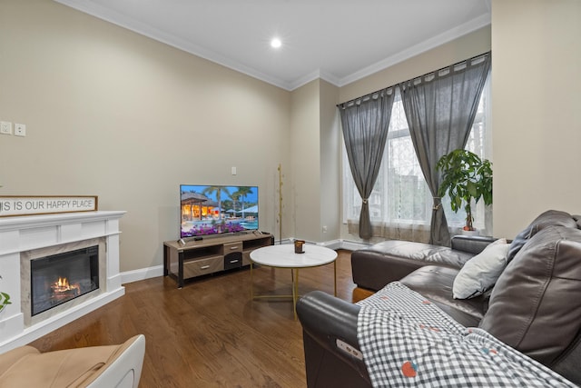 405 Commercial Ave, Cliffside Park, NJ 07010 - living room featuring wood finished floors, crown molding, a glass covered fireplace, and recessed lighting