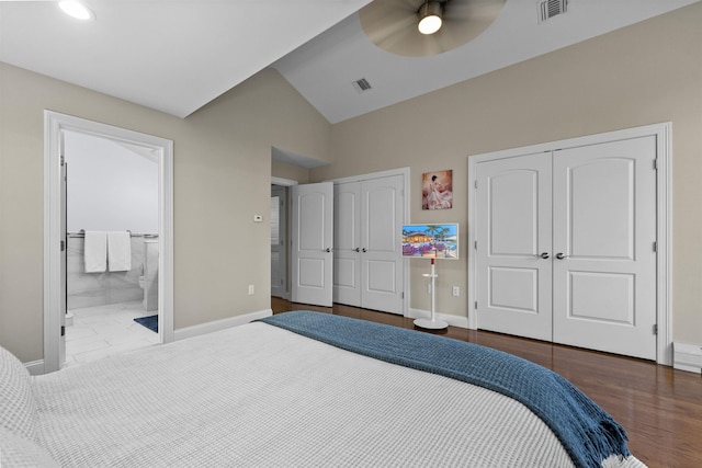 405 Commercial Ave, Cliffside Park, NJ 07010 - bedroom with two closets, vaulted ceiling, ensuite bath, wood finished floors, and recessed lighting