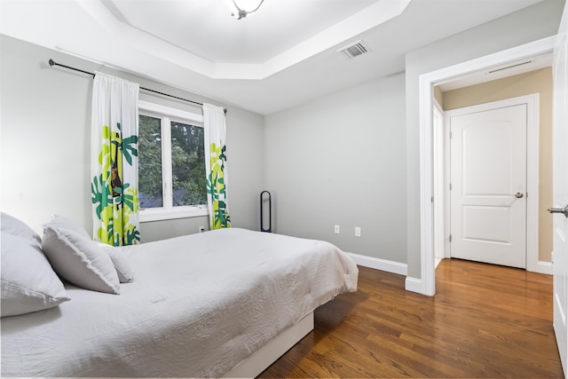 405 Commercial Ave, Cliffside Park, NJ 07010 - bedroom with a tray ceiling and wood finished floors