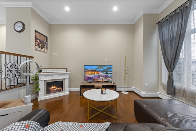 405 Commercial Ave, Cliffside Park, NJ 07010 - living area featuring wood finished floors, a glass covered fireplace, crown molding, and recessed lighting