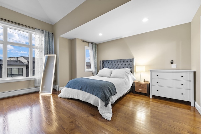 405 Commercial Ave, Cliffside Park, NJ 07010 - bedroom featuring wood finished floors and baseboard heating