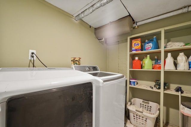 laundry room featuring laundry area and separate washer and dryer