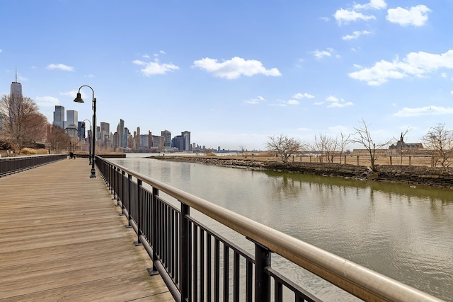 174 Washington St Unit 2K, Jersey City, NJ 07302 - dock area featuring a water view and a view of skyline