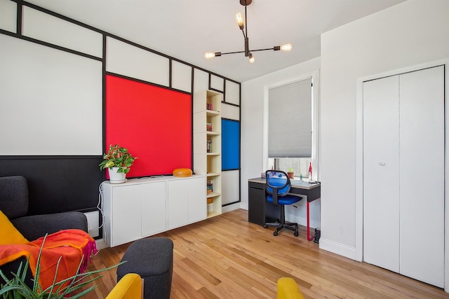 527 34th St Unit D1, Union City, NJ 07087 - office featuring light wood-style flooring and a chandelier