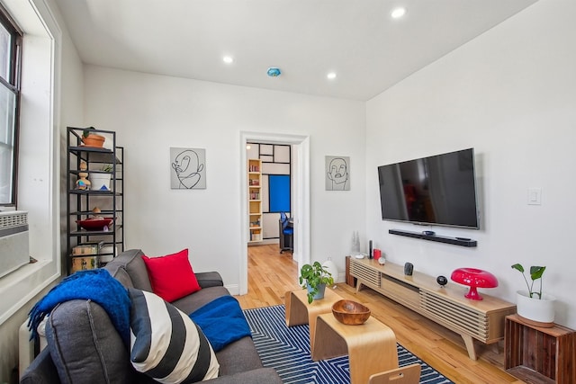527 34th St Unit D1, Union City, NJ 07087 - living room with wood finished floors, recessed lighting, and baseboards