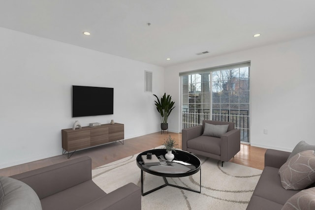 443 2nd St Unit 0212, Jersey City, NJ 07302 - living room with visible vents, recessed lighting, and wood finished floors