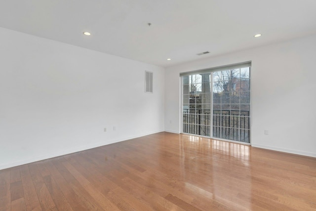 443 2nd St Unit 0212, Jersey City, NJ 07302 - unfurnished room featuring recessed lighting, wood finished floors, and visible vents
