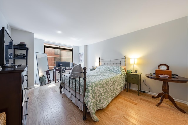 700 1st St Unit 11M, Hoboken, NJ 07030 - bedroom with light wood-style flooring and baseboards