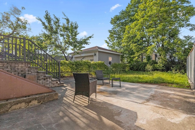 57 W 5th St, Bayonne, NJ 07002 - view of patio / terrace featuring an outdoor structure and stairs