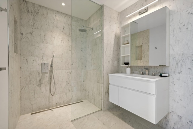 full bath featuring vanity, walk in shower, and recessed lighting