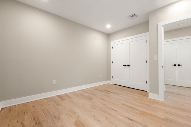 211 Summit Ave Unit 2, Jersey City, NJ 07304 - unfurnished bedroom with light wood finished floors and recessed lighting