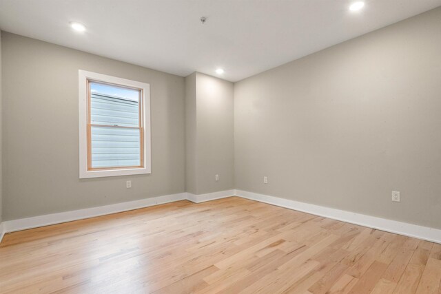 211 Summit Ave Unit 2, Jersey City, NJ 07304 - empty room featuring light wood-style floors, recessed lighting, and fire sprinkler in ceiling