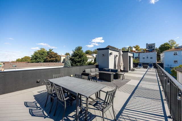 wooden deck featuring an outdoor living space