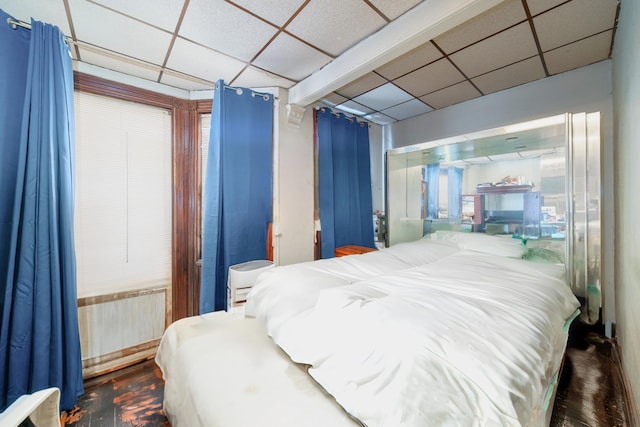 bedroom featuring a drop ceiling